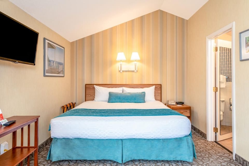 Unwind into crisp linens after a beach-filled day outside.