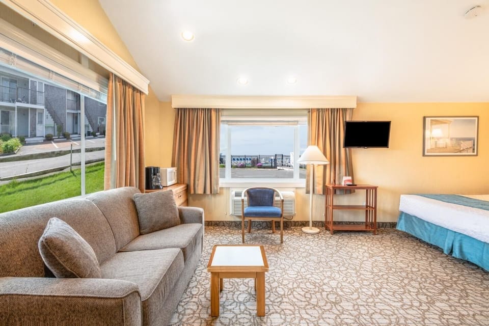 Stretch out on the sofa and savor the airy open layout.