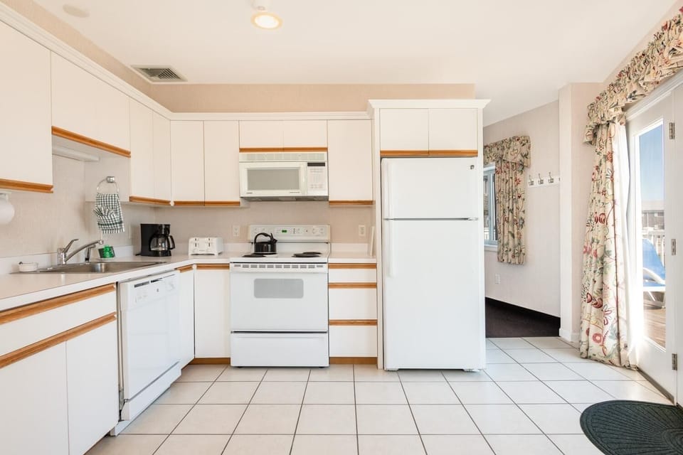 Cook simple meals in the bright, fully equipped kitchen.