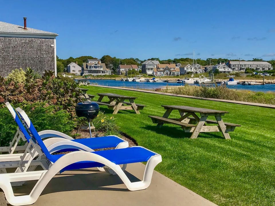 Relax on the lawn with picnic tables and harbor views.