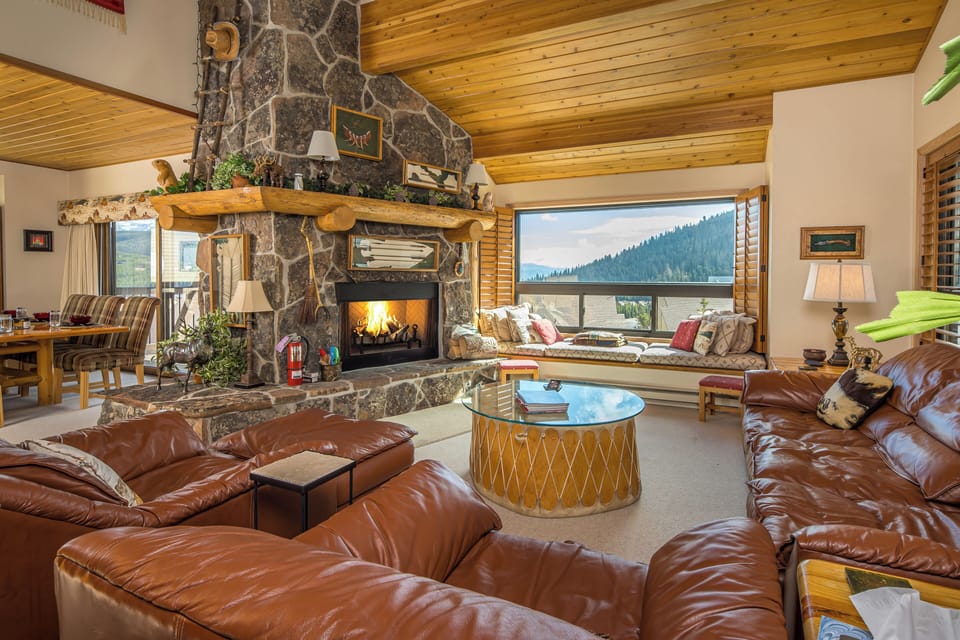 Cozy up next to the fireplace and watch the snow fall outside | Main Level