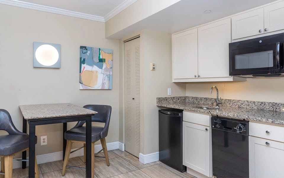 Start beach days fast with microwave, mini-fridge, and sink.