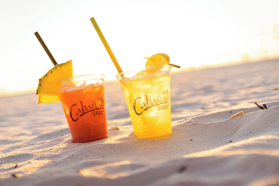 Settle in with tropical drinks and front-row ocean views.