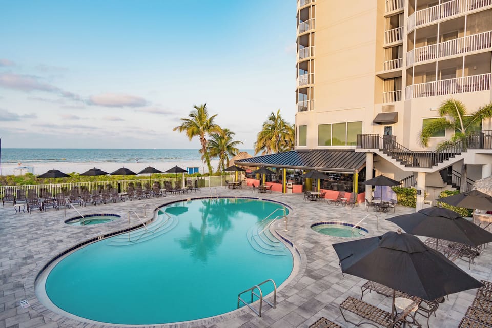 Unwind poolside with ocean breezes and plenty of loungers.