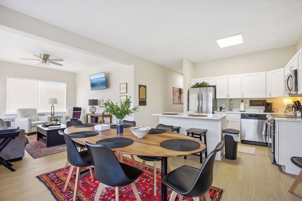Kitchen and dining room in one photo.