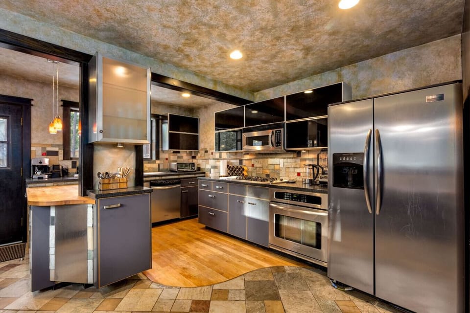 Spacious kitchen with everything you need and a cozy dining area to enjoy meals together.