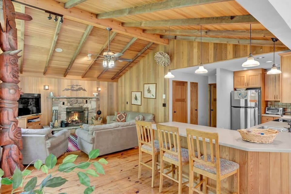 Open Kitchen with Breakfast Bar and Vaulted Wood Ceiling