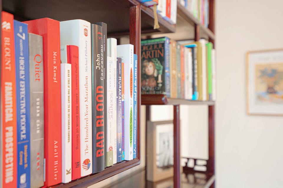 Another view of the diverse book collection available for guests to enjoy during their stay.