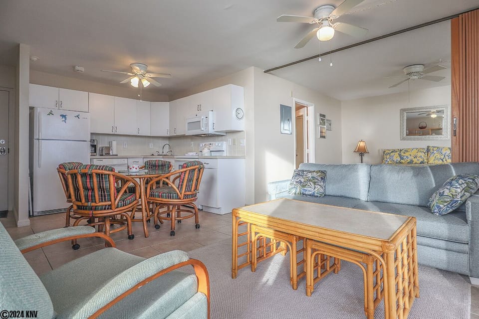 Comfortable accommodations include a sleeper sofa, easy chair and huge TV in the living area