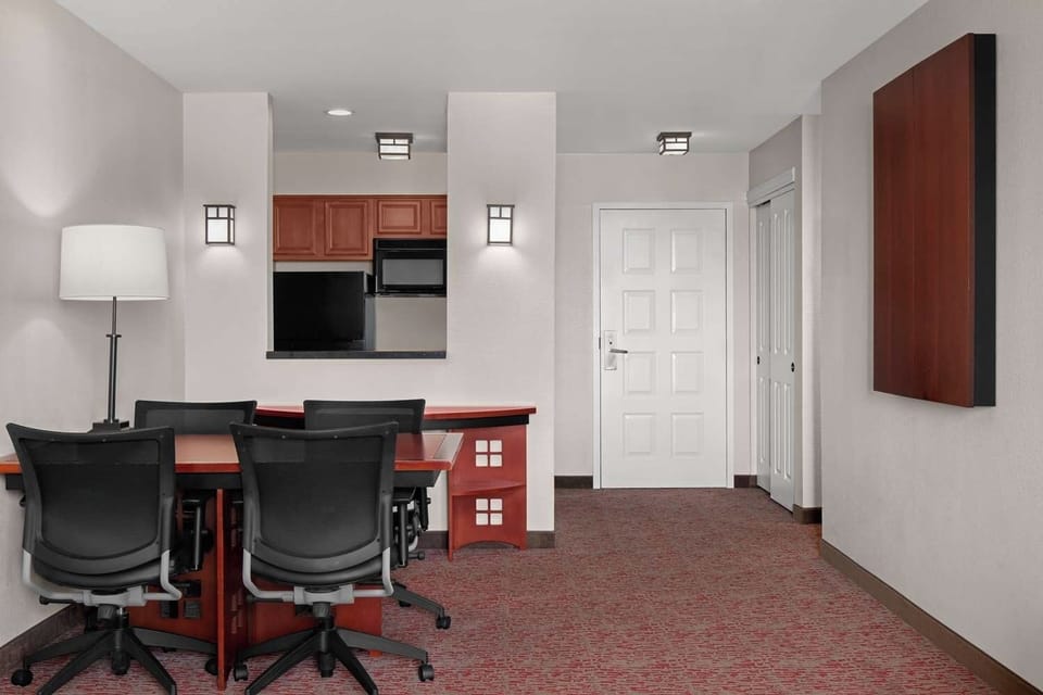 Settle in with a roomy workspace for planning tomorrow.