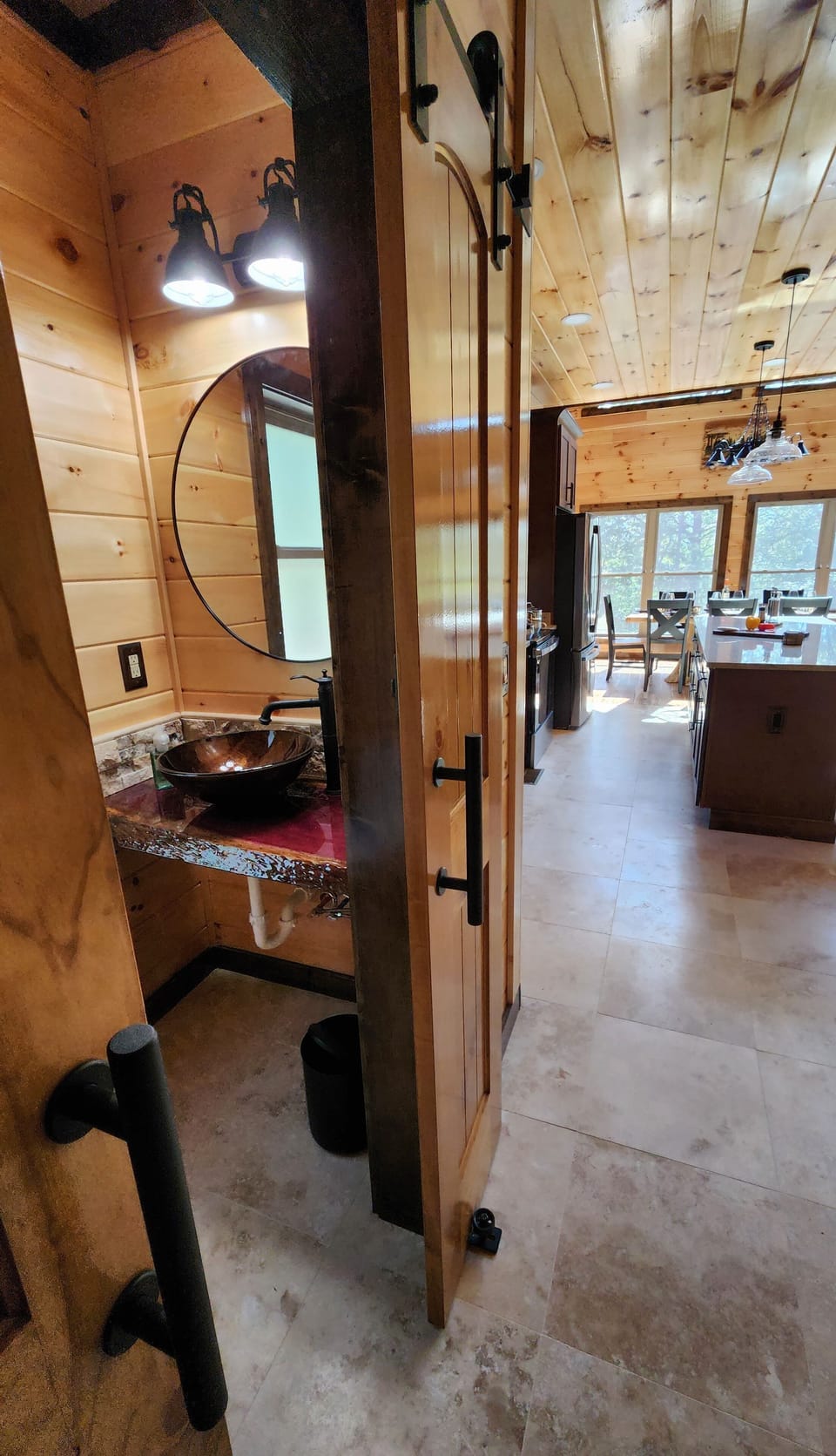 Half bathroom at entryway for main floor area