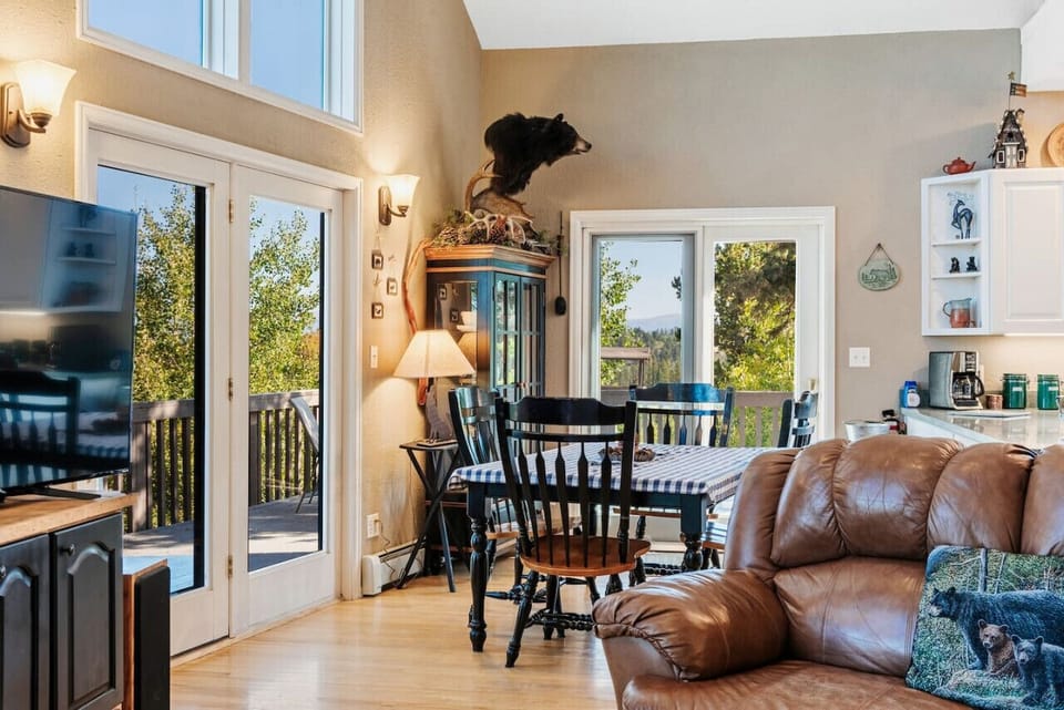 Open dining and living area with a view