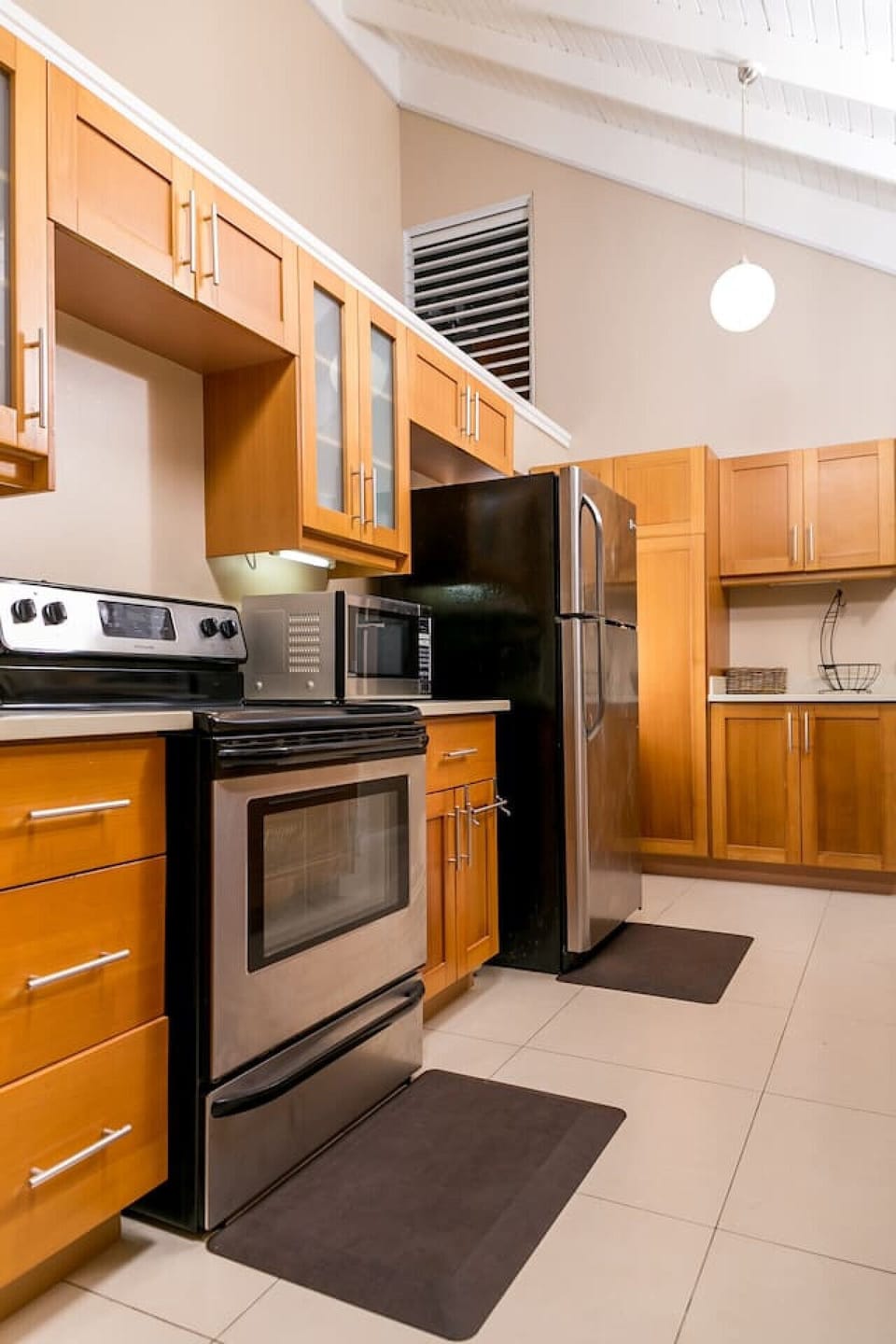 Fully equipped kitchen w/ stove, microwave & plenty of cabinet space