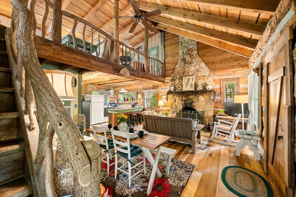Hand hewn log cabin with cathedral ceiling