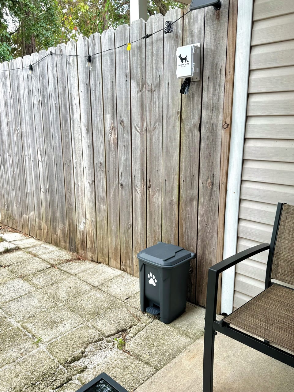Pet waste trash bags and trash bins for your convenience.