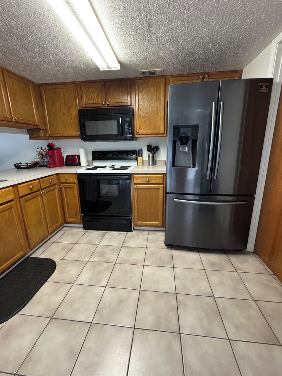 Brand new refrigerator with plenty of space for all your groceries & essentials.