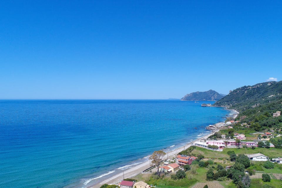 Agios Gordios sandy beach just 10min drive away