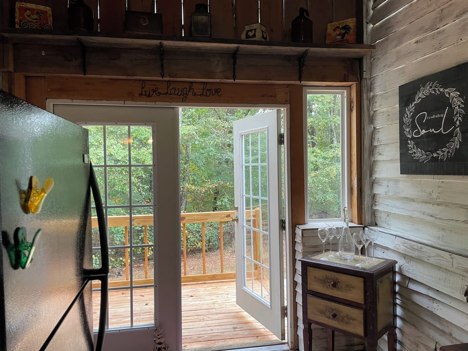 Deck off kitchen with small sitting area