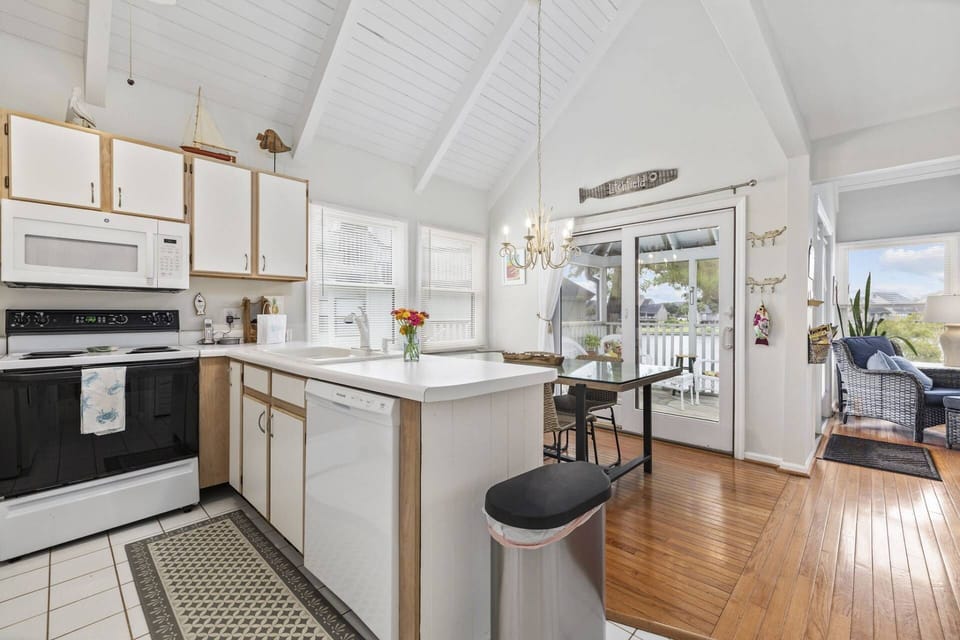 Kitchen and Dining with direct access to covered deck