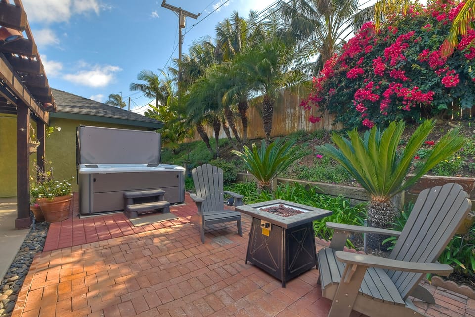 Enjoy a conversation at the firepit at night