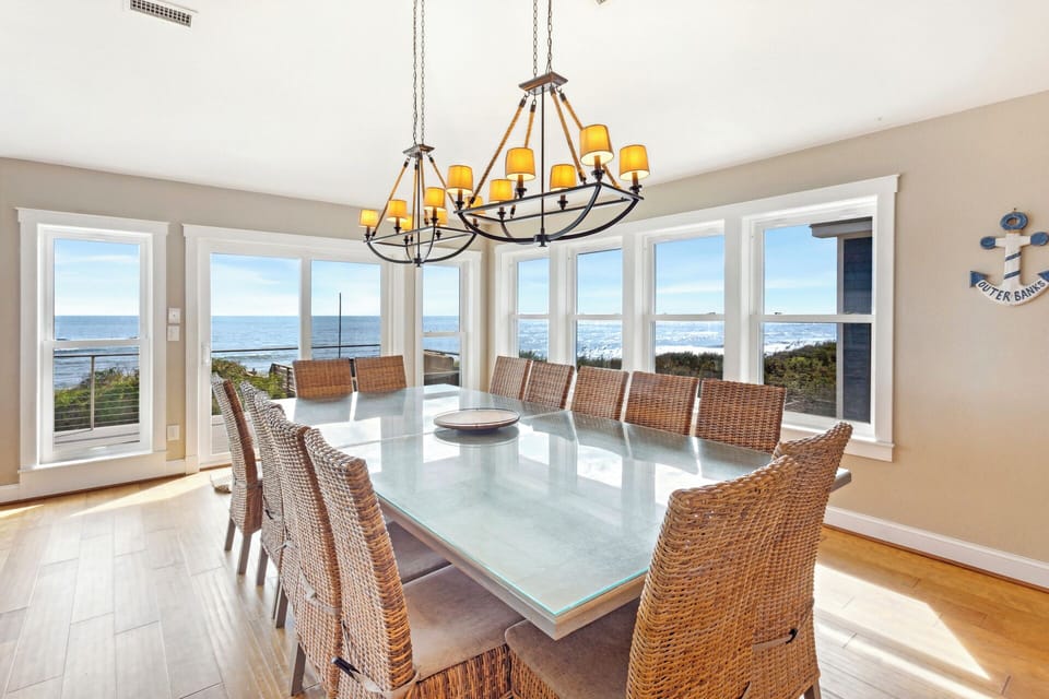 The Dining Area seats 14 and opens onto a spacious oceanfront sun deck, perfect for al fresco dining with a view.
