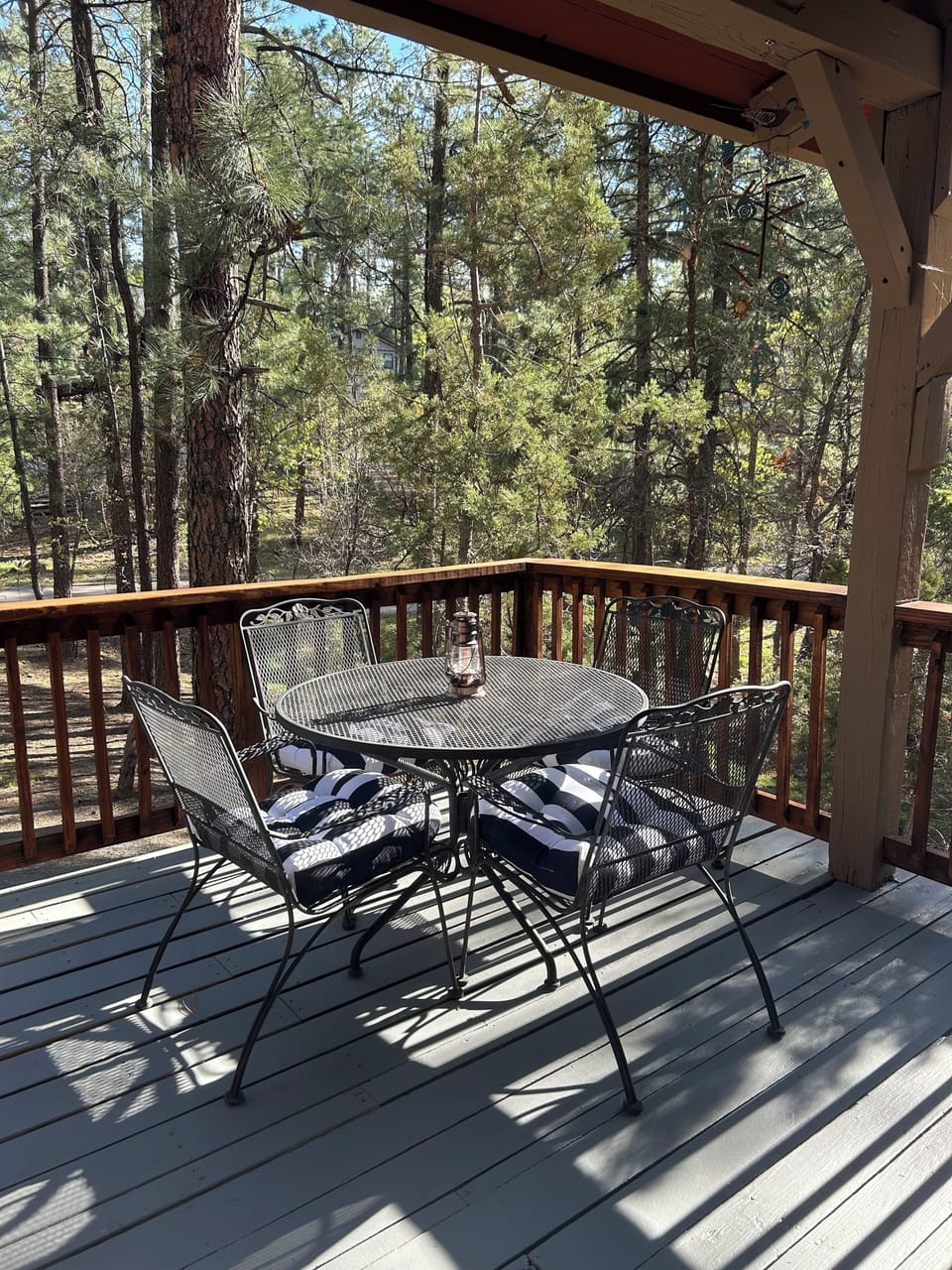 Outdoor dining for 4 on the deck, overlooking the pines.