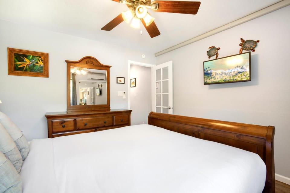 Tranquil tones create a peaceful, soul-soothing master bedroom oasis.