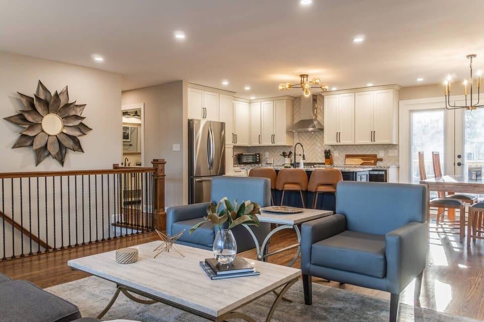 Two comfy accent chairs, parallel to our sofa, not only provide extra seating but also add to the beauty of the living area.