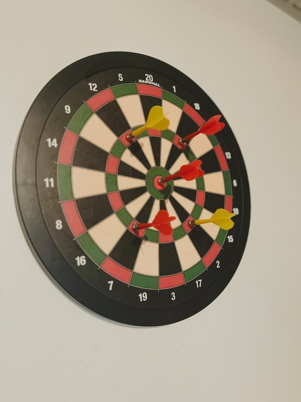 Game Room Fun: Challenge friends to darts and enjoy vibrant moments in this playful space!