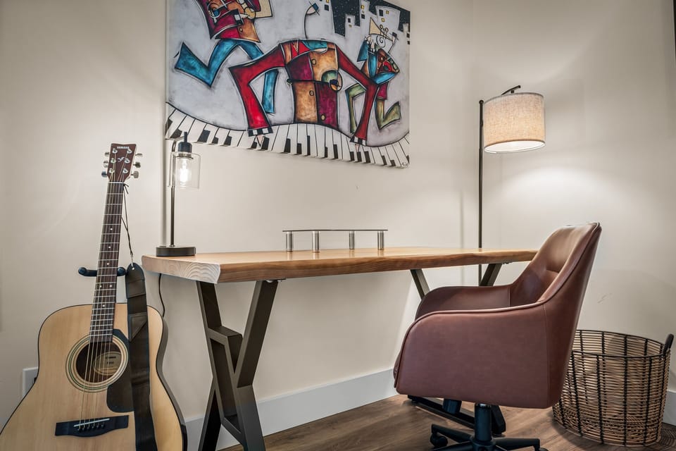 Office desk and chair in primary bedroom 