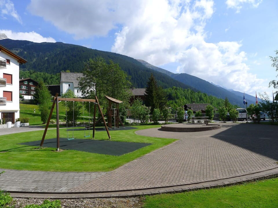 Cloud, Sky, Plant, Building, Mountain, Window, Tree, Land Lot, Urban Design, Road Surface