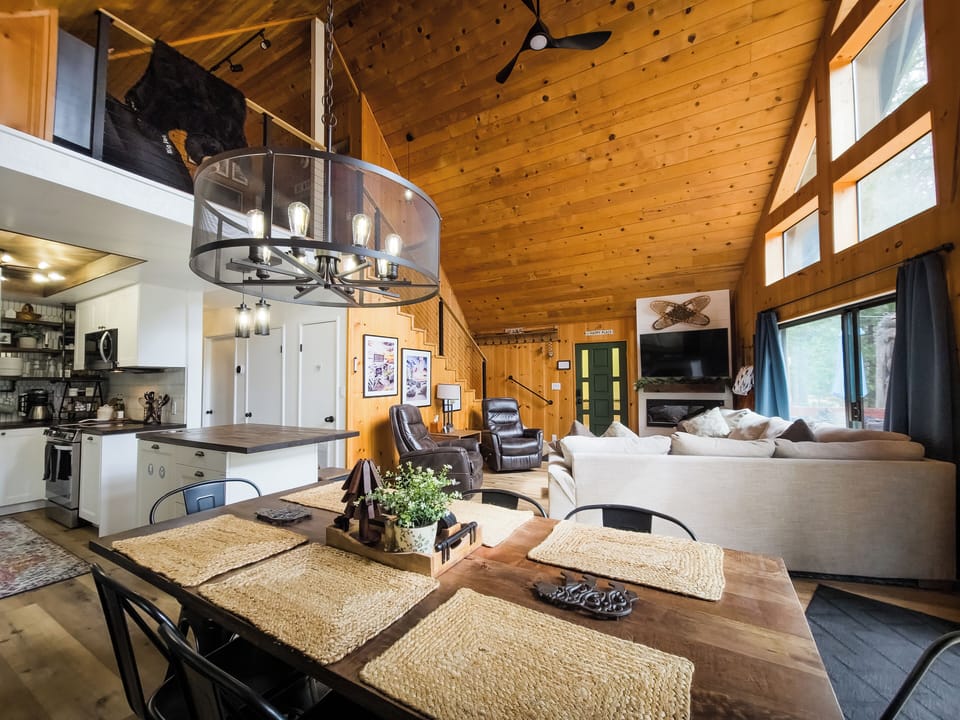 Open dining/living room area with plenty of seating.