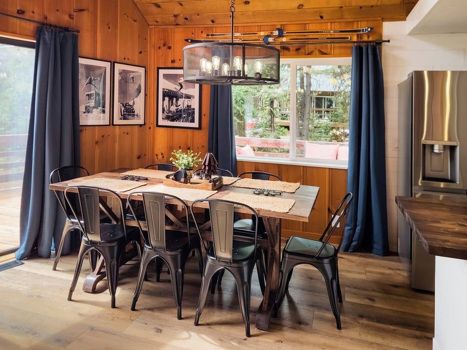 Open & spacious dining area with a large dining table with seating for eight.
