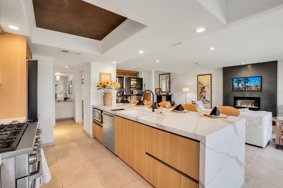 Step into a chef’s paradise in this modern kitchen, where functionality meets style. Equipped with stainless steel appliances, sleek countertops, and ample cabinet space, it invites you to cook and gather with friends and family.