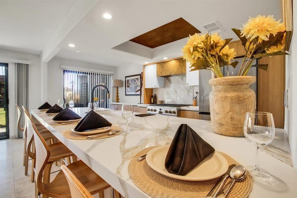 Step into a chef’s paradise in this modern kitchen, where functionality meets style. Equipped with stainless steel appliances, sleek countertops, and ample cabinet space, it invites you to cook and gather with friends and family.