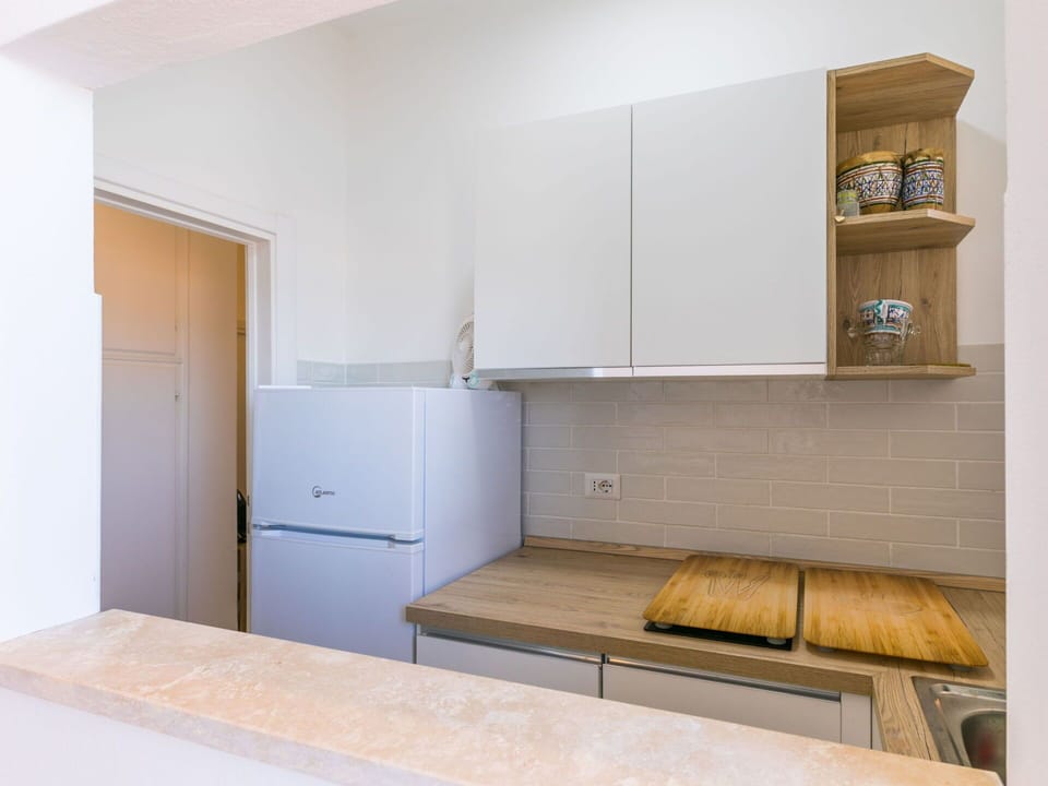 Property, Furniture, Cabinetry, Building, Wood, House, Flooring, Floor, Wood Stain, Kitchen