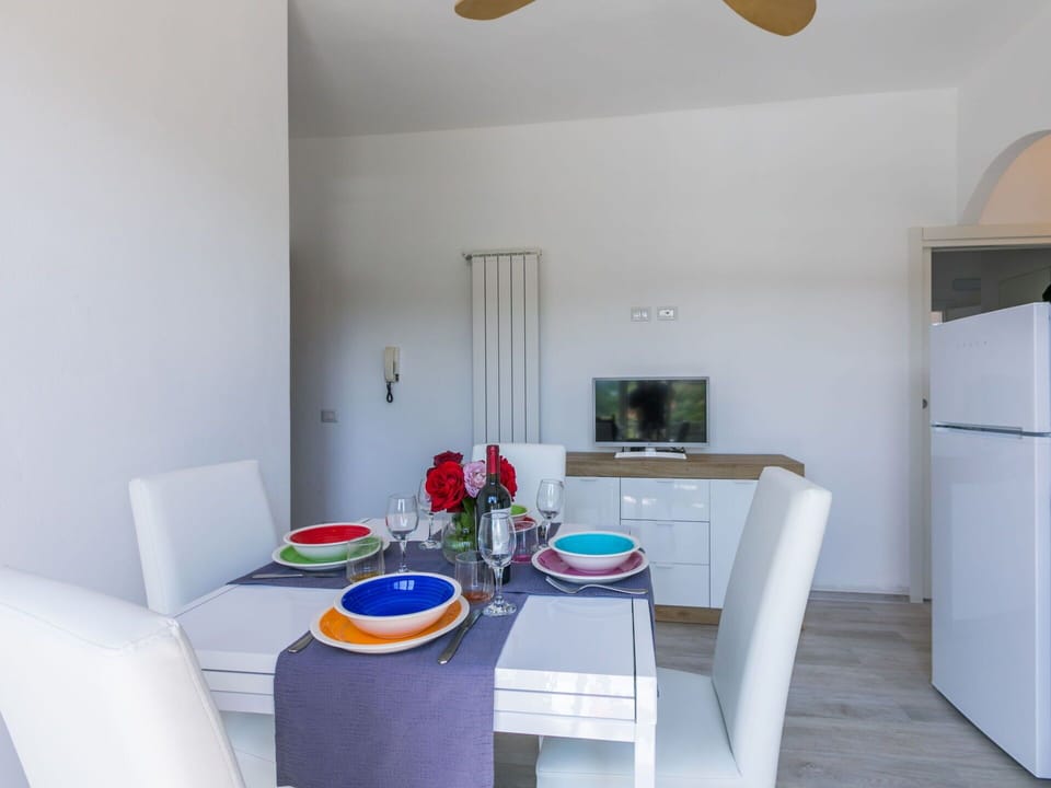 Cabinetry, Furniture, Property, Azure, Interior Design, Lighting, Architecture, Table, Flooring, Floor