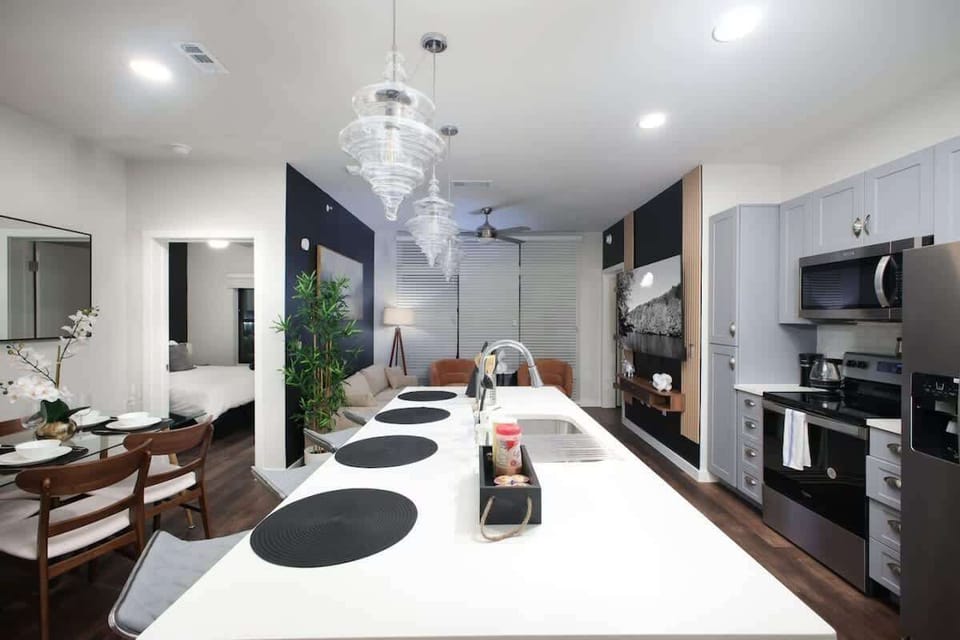 Cook and dine in style in our fully equipped kitchen, complete with a bar counter, high stools, and all the utensils you need.