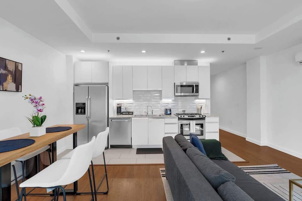 Enjoy meals and conversation at the sleek bar counter in our spacious, modern kitchen.