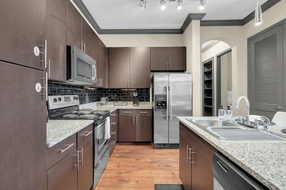 Cook up a storm in the fully equipped kitchen, complete with a stylish bar counter for casual dining.