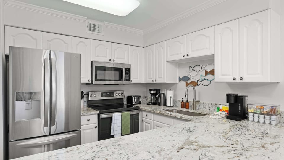 The full kitchen has plenty of prep space, and all of your basic supplies and appliances. 