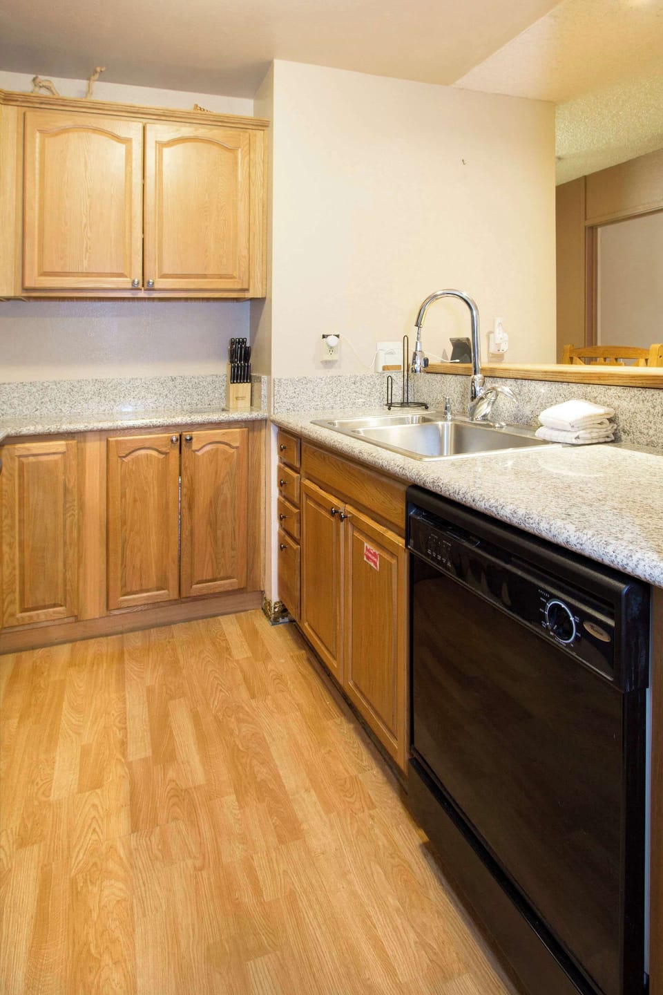 Full kitchen with drop coffee maker, toaster oven, blender, wine ware and more