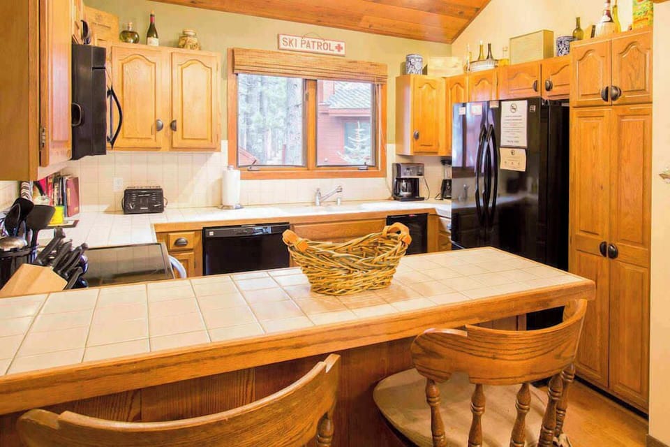 Kitchen w/ slow cooker, waffle maker, coffee maker, toaster, blender, wine chiller and more
