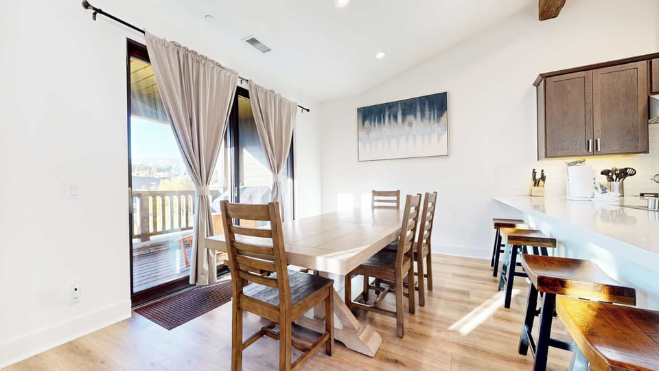 Dining area with table and seating for 6