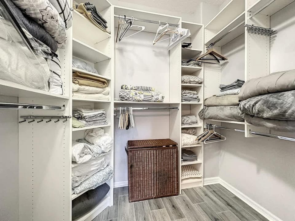 Downstairs MASTER Bedroom Closet