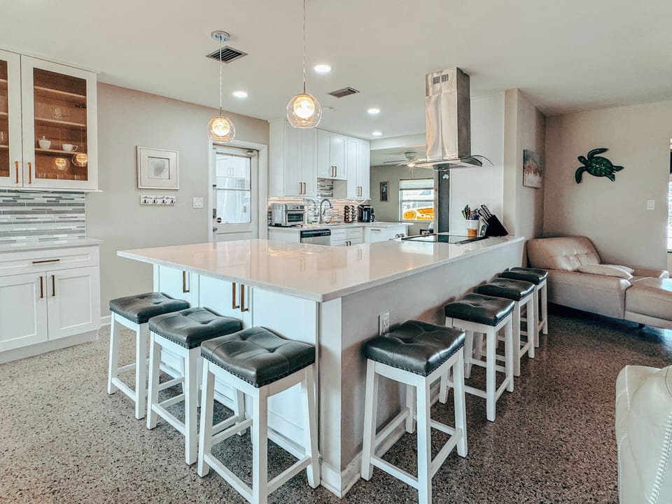 Kitchen island seating for seven; perfect for family meals.
