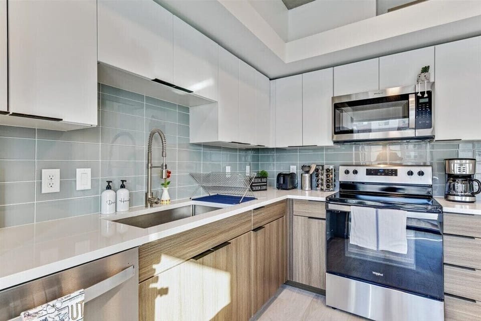 Spice rack, coffee machines, utensils, toaster