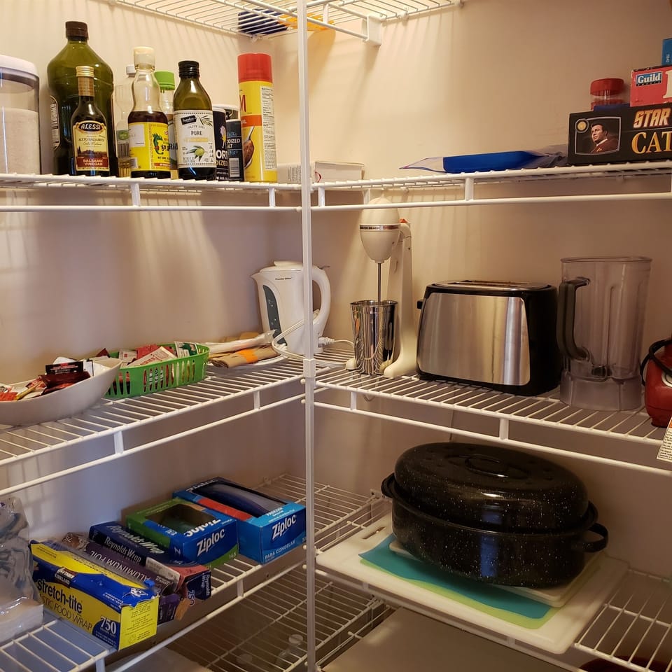 Walk in pantry has additional appliances and basic supplies