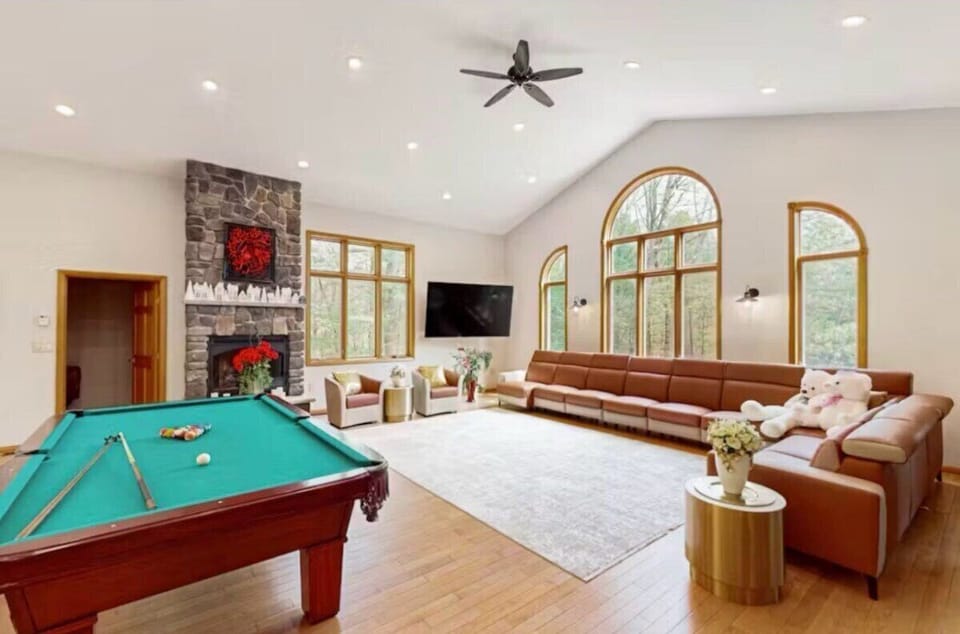 Large Living Room located on 2FL with Billiards Table, Fireplace, and Smart TV