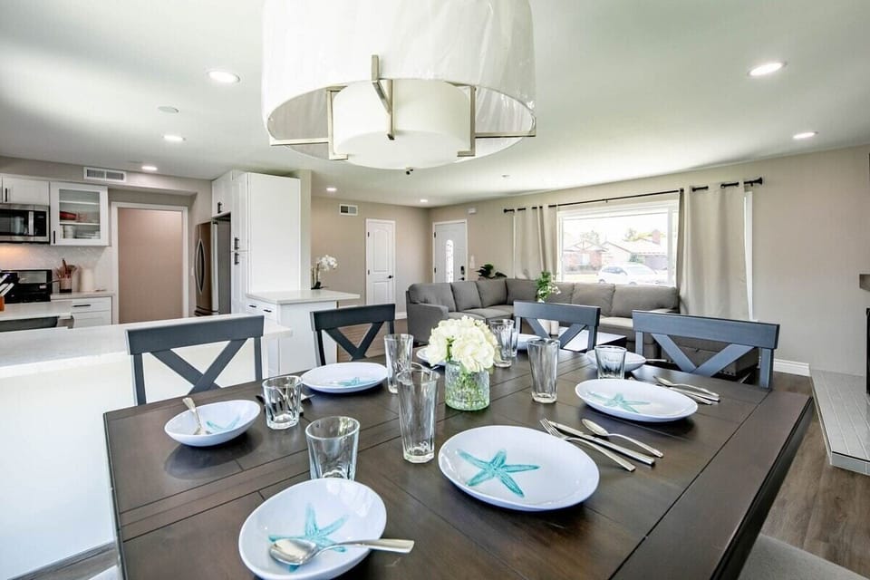 Indoor dining area designed for intimate gatherings, comfortably seating eight. 